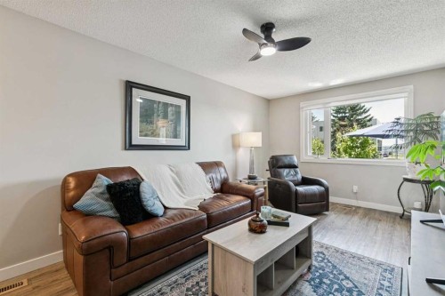 110S-203 Lynnview Road Se, Calgary, AB - Indoor Photo Showing Living Room