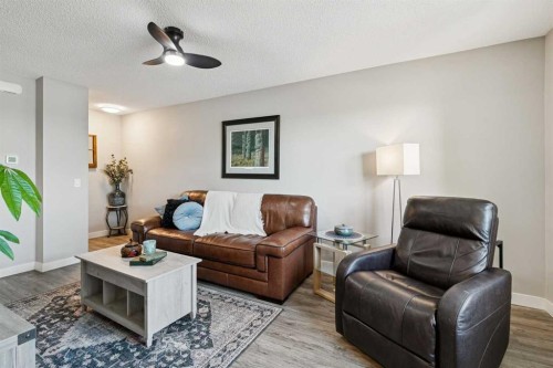 110S-203 Lynnview Road Se, Calgary, AB - Indoor Photo Showing Living Room