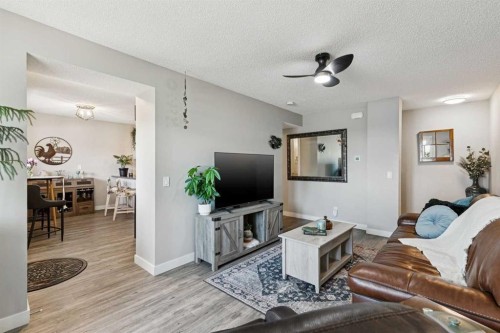 110S-203 Lynnview Road Se, Calgary, AB - Indoor Photo Showing Living Room