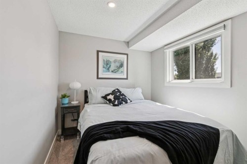 110S-203 Lynnview Road Se, Calgary, AB - Indoor Photo Showing Bedroom