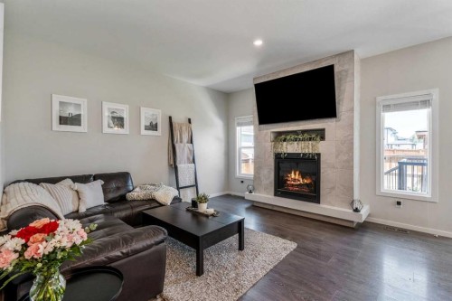 159 Pacific Landing West, Lethbridge, AB - Indoor Photo Showing Living Room With Fireplace