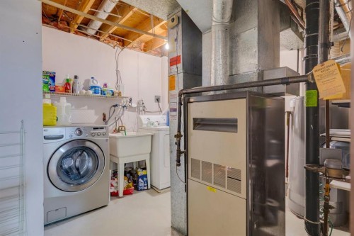 283 Abinger Crescent Ne, Calgary, AB - Indoor Photo Showing Laundry Room