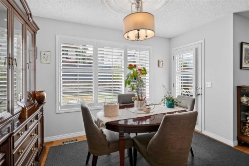 121 Rockyspring Terrace Nw, Calgary, AB - Indoor Photo Showing Dining Room
