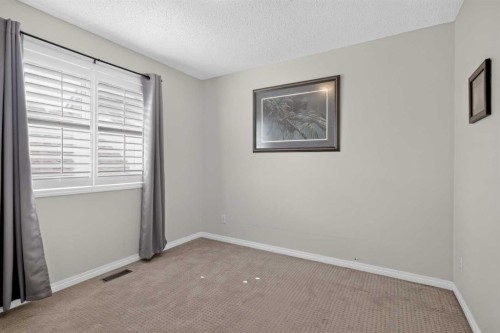 121 Rockyspring Terrace Nw, Calgary, AB - Indoor Photo Showing Other Room