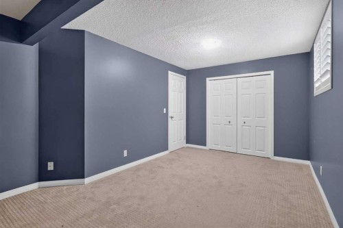 121 Rockyspring Terrace Nw, Calgary, AB - Indoor Photo Showing Other Room