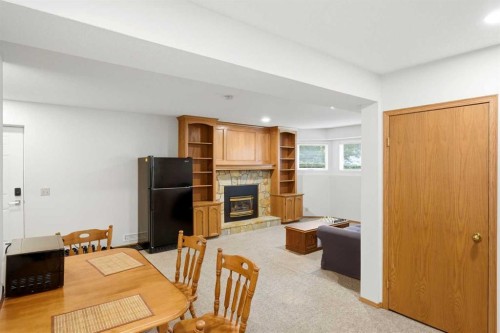 5 Sandpiper Gate Nw, Calgary, AB - Indoor With Fireplace