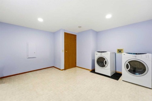5 Sandpiper Gate Nw, Calgary, AB - Indoor Photo Showing Laundry Room