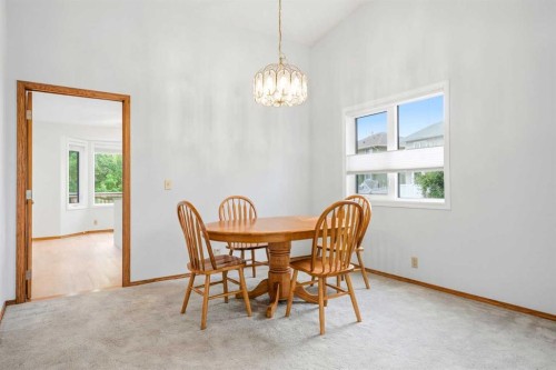 5 Sandpiper Gate Nw, Calgary, AB - Indoor Photo Showing Dining Room