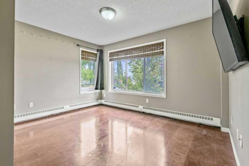 2-21 Mckenzie Towne Gate Se, Calgary, AB - Indoor Photo Showing Other Room