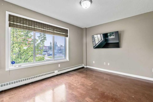 2-21 Mckenzie Towne Gate Se, Calgary, AB - Indoor Photo Showing Other Room