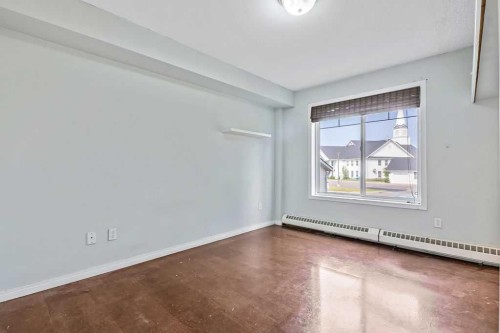 2-21 Mckenzie Towne Gate Se, Calgary, AB - Indoor Photo Showing Other Room