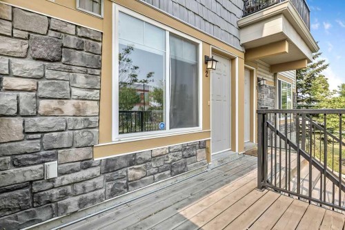 2-21 Mckenzie Towne Gate Se, Calgary, AB - Outdoor With Deck Patio Veranda With Exterior