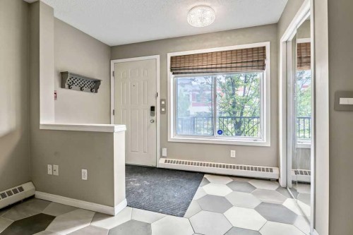 2-21 Mckenzie Towne Gate Se, Calgary, AB - Indoor Photo Showing Other Room