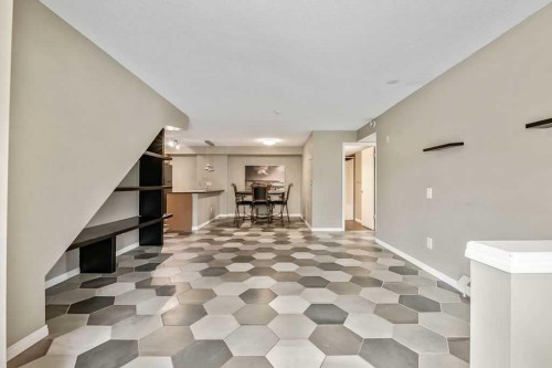 2-21 Mckenzie Towne Gate Se, Calgary, AB - Indoor Photo Showing Other Room