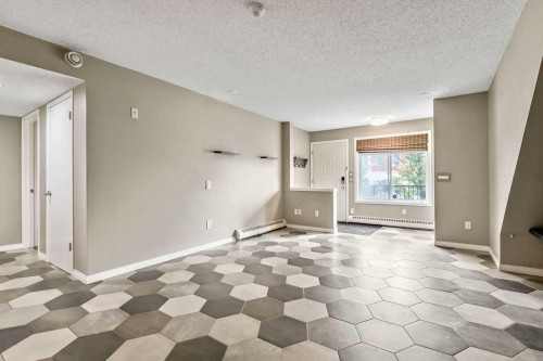 2-21 Mckenzie Towne Gate Se, Calgary, AB - Indoor Photo Showing Other Room