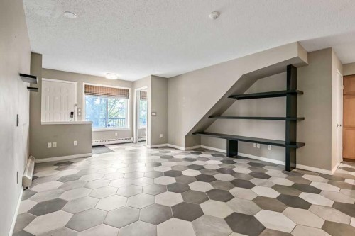 2-21 Mckenzie Towne Gate Se, Calgary, AB - Indoor Photo Showing Other Room