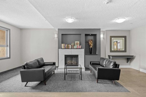 2213-73 Erin Woods Court, Calgary, AB - Indoor With Fireplace