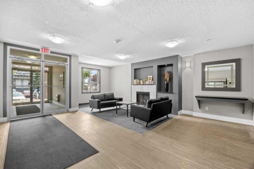 2213-73 Erin Woods Court, Calgary, AB - Indoor With Fireplace