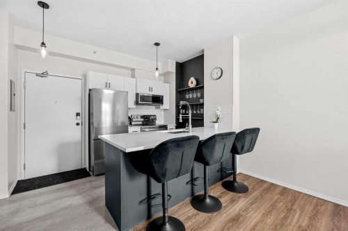 2213-73 Erin Woods Court, Calgary, AB - Indoor Photo Showing Living Room