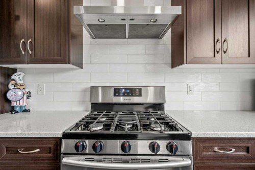 147 Evanscrest Park Nw, Calgary, AB - Indoor Photo Showing Kitchen With Upgraded Kitchen