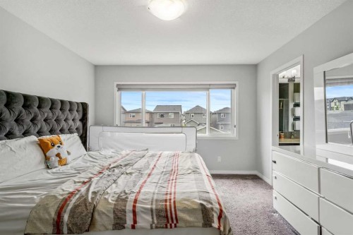 147 Evanscrest Park Nw, Calgary, AB - Indoor Photo Showing Bedroom