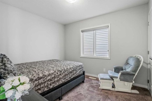 147 Evanscrest Park Nw, Calgary, AB - Indoor Photo Showing Bedroom