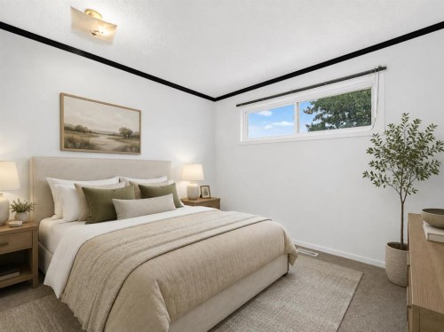 403-11010 Bonaventure Drive Se, Calgary, AB - Indoor Photo Showing Bedroom