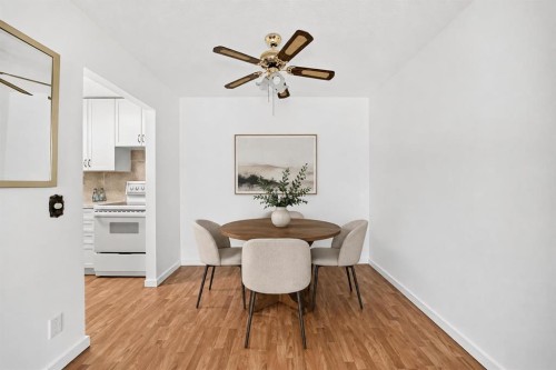 403-11010 Bonaventure Drive Se, Calgary, AB - Indoor Photo Showing Dining Room