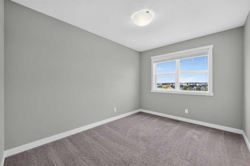 905 Evanston Manor Nw, Calgary, AB - Indoor Photo Showing Other Room