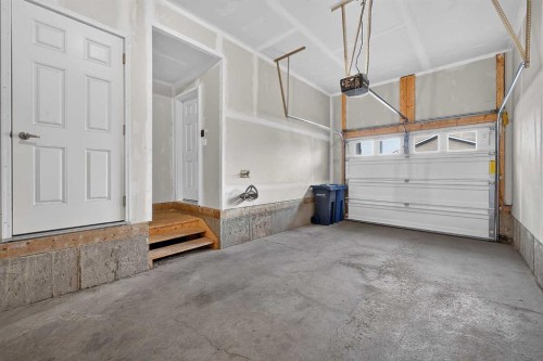 905 Evanston Manor Nw, Calgary, AB - Indoor Photo Showing Garage