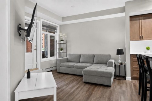 2115-3727 Sage Hill Drive Nw, Calgary, AB - Indoor Photo Showing Living Room