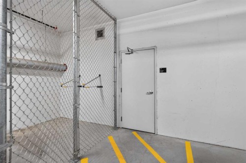 2115-3727 Sage Hill Drive Nw, Calgary, AB - Indoor Photo Showing Garage
