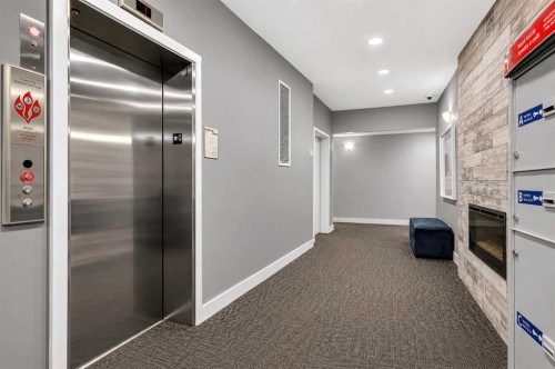 2115-3727 Sage Hill Drive Nw, Calgary, AB - Indoor Photo Showing Other Room