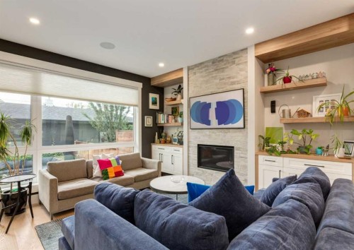 523 22 Avenue Nw, Calgary, AB - Indoor Photo Showing Living Room With Fireplace