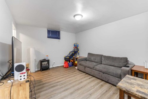 67 Falchurch Crescent Ne, Calgary, AB - Indoor Photo Showing Living Room