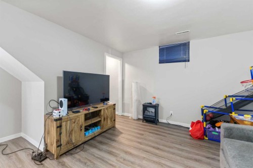 67 Falchurch Crescent Ne, Calgary, AB - Indoor Photo Showing Other Room
