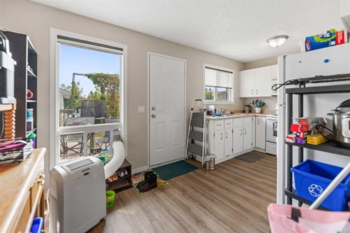 67 Falchurch Crescent Ne, Calgary, AB - Indoor Photo Showing Laundry Room