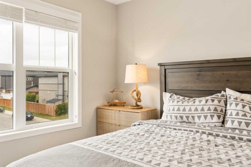 848 Chinook Gate Parade Sw, Airdrie, AB - Indoor Photo Showing Bedroom