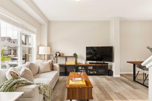 848 Chinook Gate Parade Sw, Airdrie, AB - Indoor Photo Showing Living Room