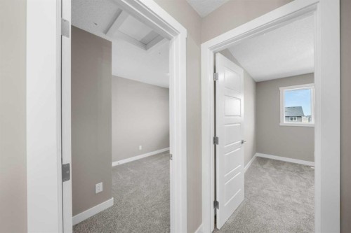 94 Sora Gardens Se, Calgary, AB - Indoor Photo Showing Other Room
