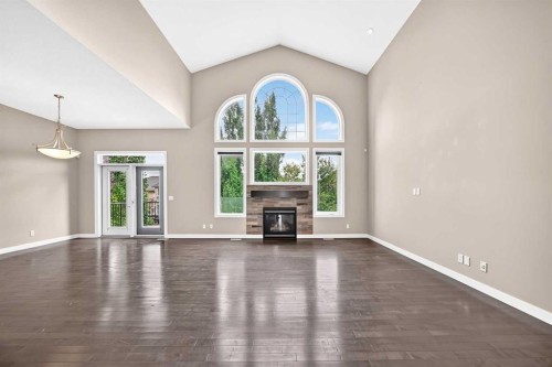 145 Cranridge Terrace Se, Calgary, AB - Indoor With Fireplace