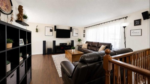 31 Penrith Place Se, Calgary, AB - Indoor Photo Showing Living Room