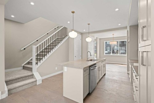660 Sora Boulevard Se, Calgary, AB - Indoor Photo Showing Kitchen With Upgraded Kitchen