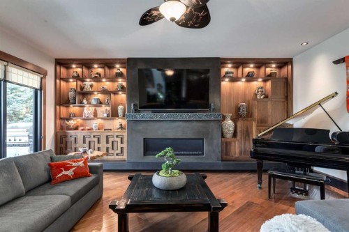 5812 Baroc Road Nw, Calgary, AB - Indoor Photo Showing Living Room With Fireplace