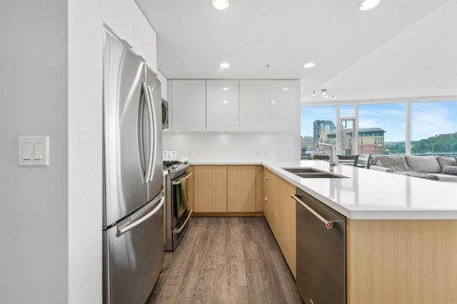 402-519 Riverfront Avenue Se, Calgary, AB - Indoor Photo Showing Kitchen With Stainless Steel Kitchen With Double Sink With Upgraded Kitchen