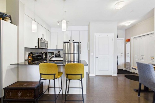 4101-5305 32 Avenue Sw, Calgary, AB - Indoor Photo Showing Kitchen With Double Sink
