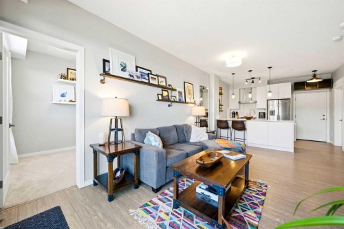 618-122 Mahogany Centre Se, Calgary, AB - Indoor Photo Showing Living Room