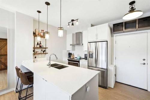 618-122 Mahogany Centre Se, Calgary, AB - Indoor Photo Showing Kitchen With Upgraded Kitchen