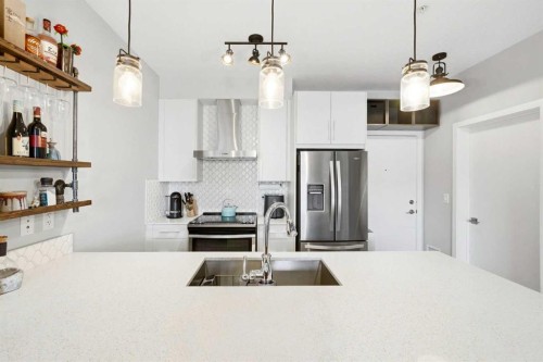 618-122 Mahogany Centre Se, Calgary, AB - Indoor Photo Showing Kitchen With Upgraded Kitchen
