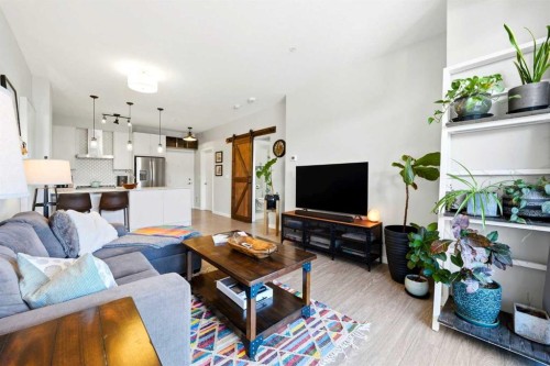 618-122 Mahogany Centre Se, Calgary, AB - Indoor Photo Showing Living Room
